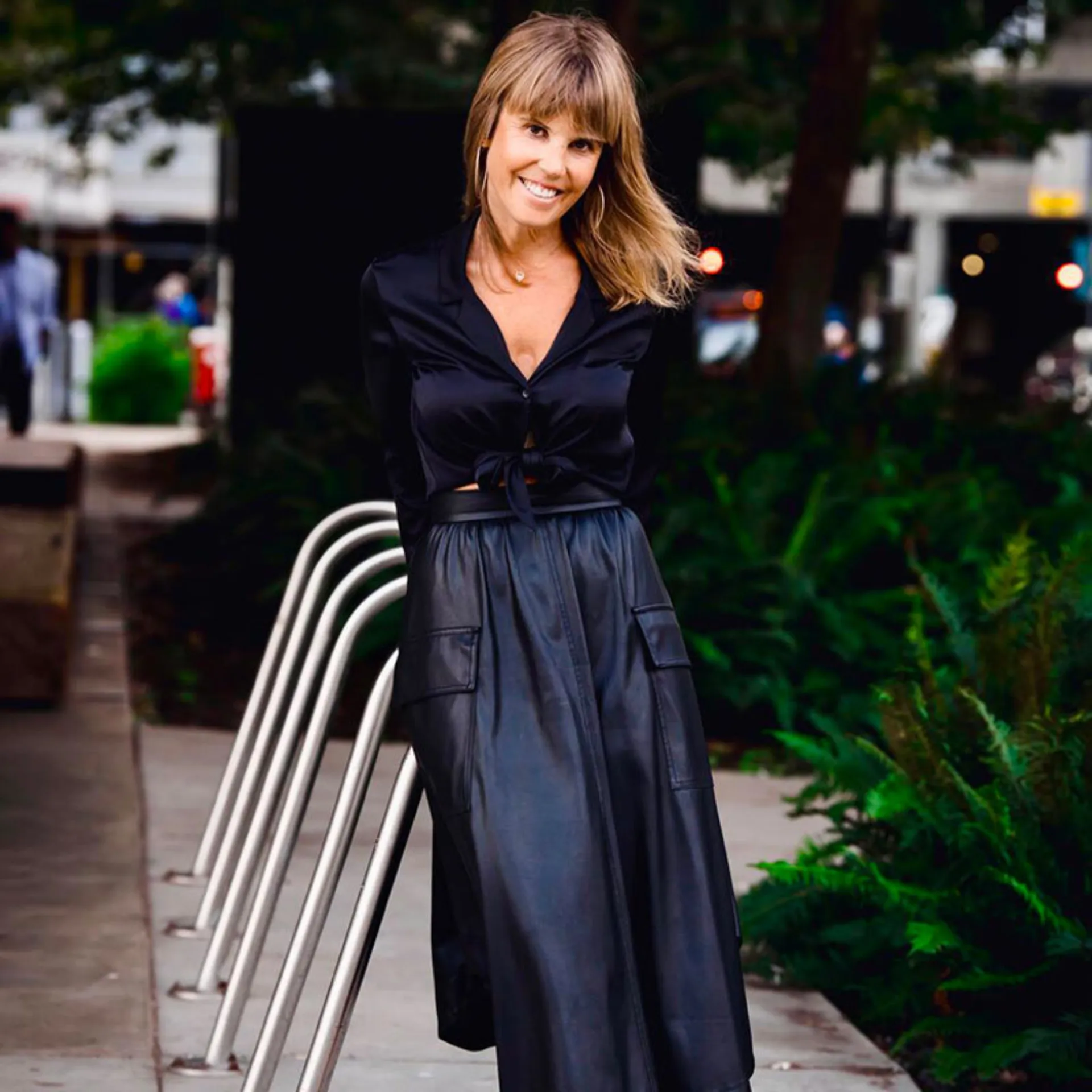 Erica black dress leaning 800x800